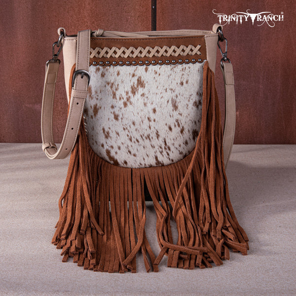 Punchy online hair on cowhide with buckstitch straw bag